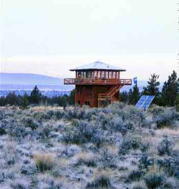 
In Central Oregon’s high desert, with sweeping mountain views, the Solar Lookout home is designed after 1930s-era fire lookout towers. Built of 75 percent recycled woods and powered by solar energy, it stands as a model of creative design and sustainability.
